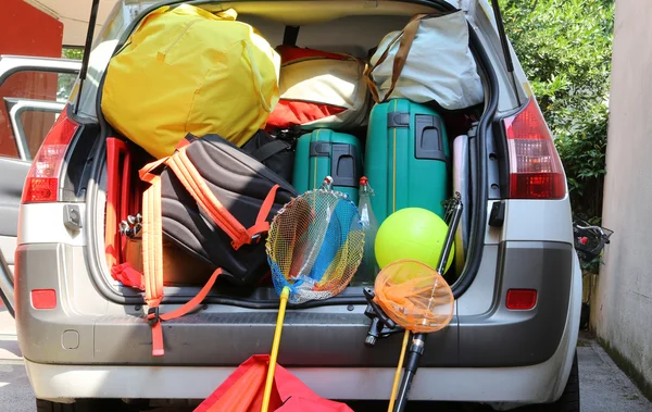 Suitcases and luggage in family car