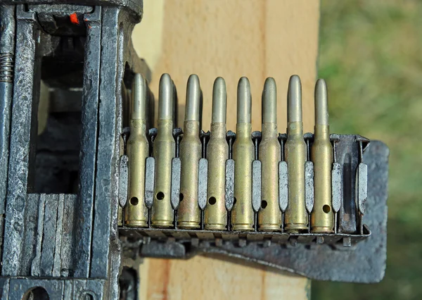 Army machine gun with ammunition