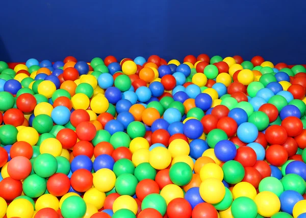 Gym in the kindergarten with many colored plastic balls