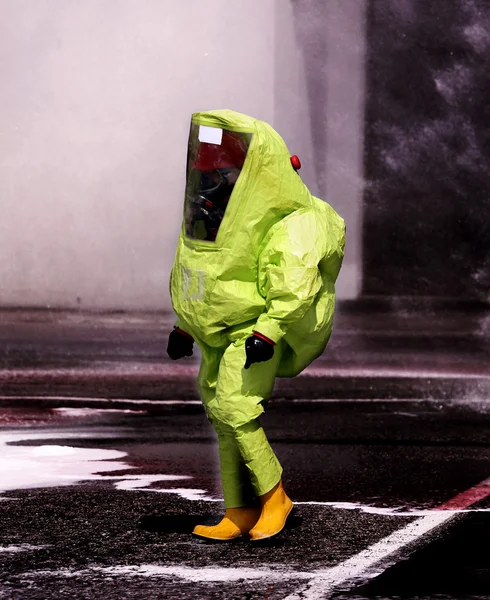 Man with yellow protective gear against biological risk