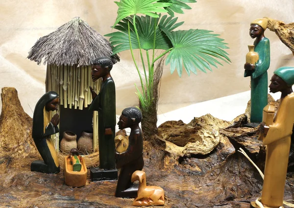 African nativity scene with baby jesus joseph and mary in a hut