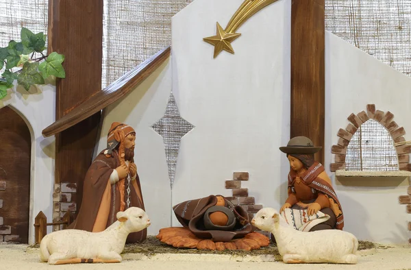 Crib of South America with baby Jesus and the terracotta figurin