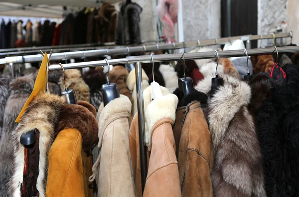 Jackets fur coat hanging and second-hand clothes for sale in fl