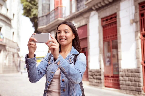 Girl tourist taking picture