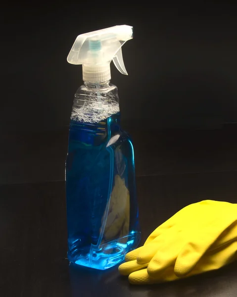 Domestic Cleaning with solution and Protective Gloves