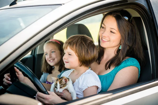 Mother and child driving car