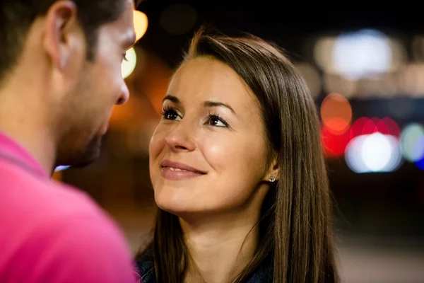 Young couple on date at night