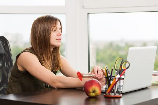 Student girl working at the computer