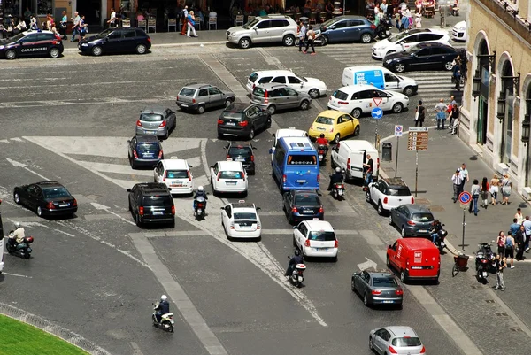 Cars and people in Rome city