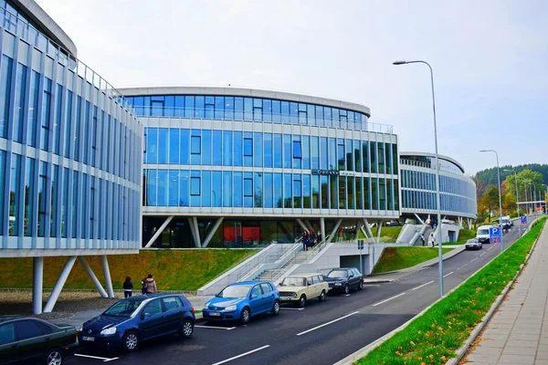 Vilnius city street, cars and Danske Bank view