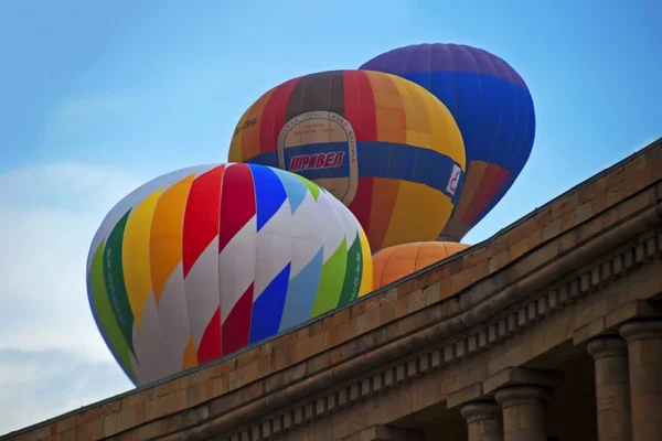 Yerevan, Armenia - April 09, 2008: colorful hot air balloon near the Government building on Republic square (designed by architect Alexander Tamanian)