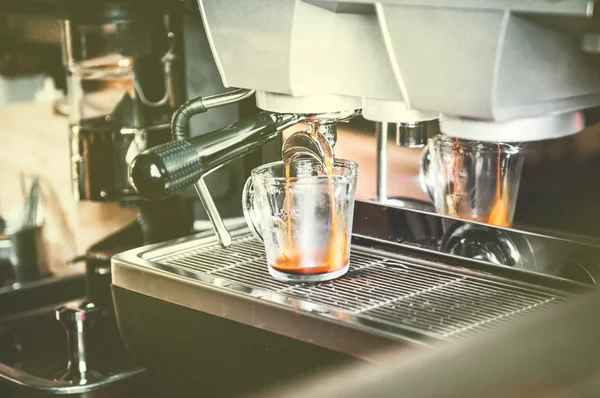Closeup of coffee machine making espresso process