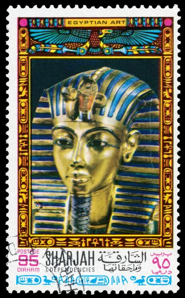 Stamp printed Sharjah shows the mask of Tutankhamun\'s mummy head