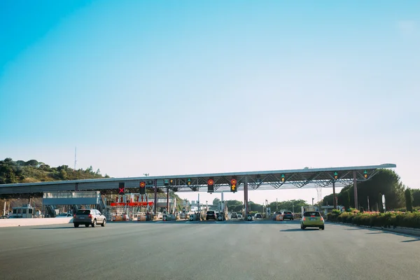 Cars passing through the point of toll highway, toll station nea