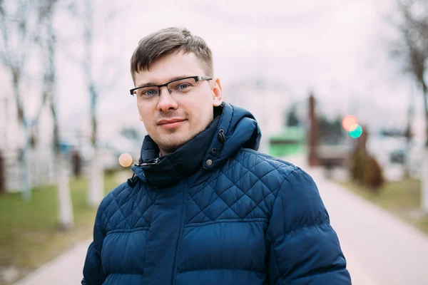 Young Handsome Man In Blue Jacket Outdoor. Spring Season.