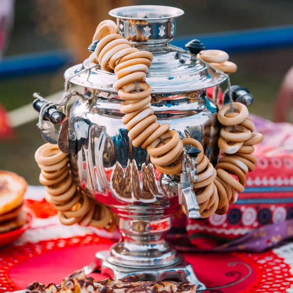 Traditional Russian Samovar With Bagels Is On Table