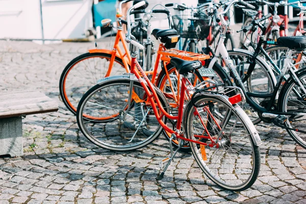 Parked Bicycles On Sidewalk. Bike Bicycle Parking In Helsinki, F