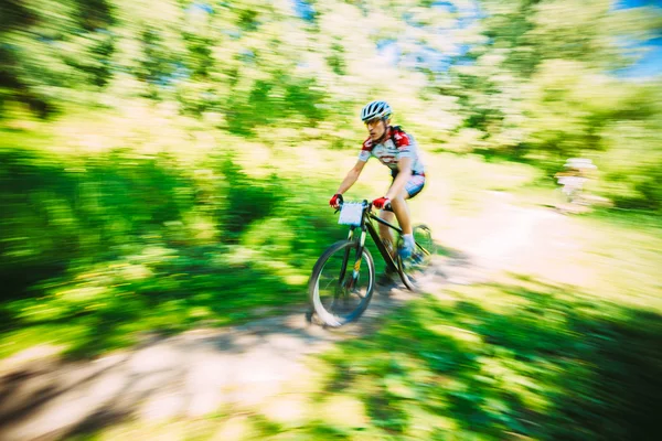 Abstract motions blur background of mountain Bike cyclist riding