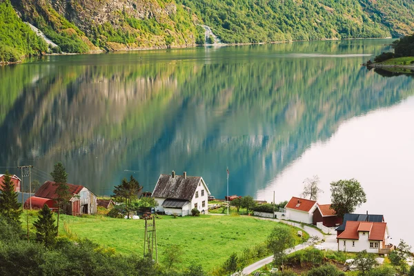 Scandinavian Houses On The Shore Of The Narrowest Fjord In Norway