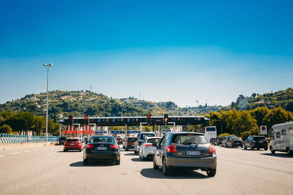 Cars passing through the point of toll highway, toll station.
