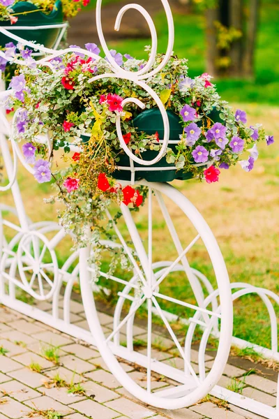 White Decorative Bicycle Parking In Garden