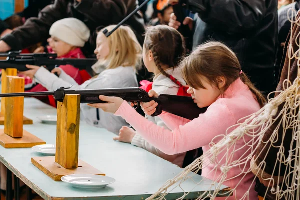 Unrecognizable Belarusian secondary school pupils girl shooting