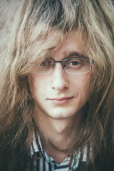 Portrait Of Rock Star Young Man Guy With Glasses And Long Hair