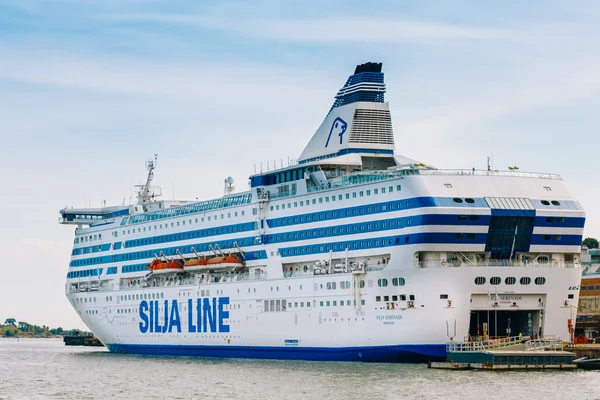 Modern ferry boat - Silja Line - at pier awaiting loading cargo