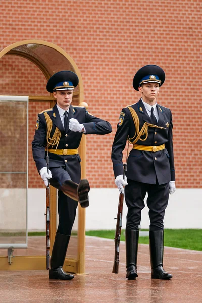 Post honor guard at the Eternal Flame in Moscow at the Tomb of the Unknown Soldier in the Alexander Garden in Moscow close by Kremlin walls