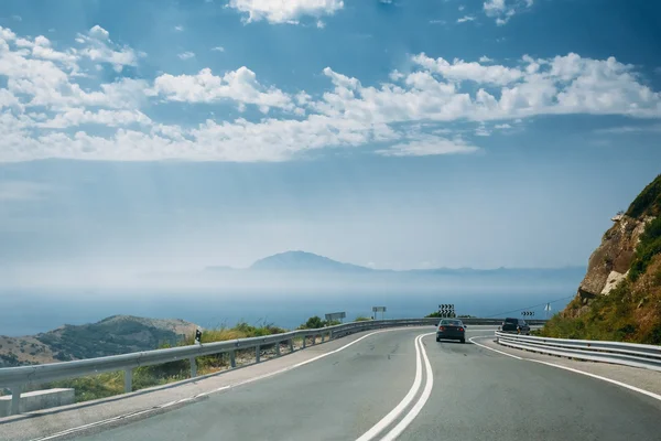 The movement of vehicles on freeway, motorway against the backgr