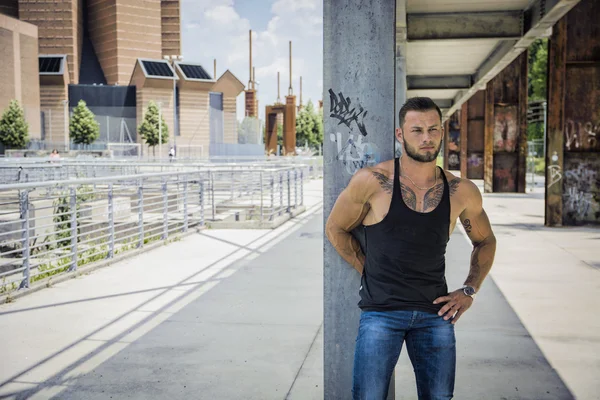 Handsome Muscular Hunk Man Outdoor in City Setting