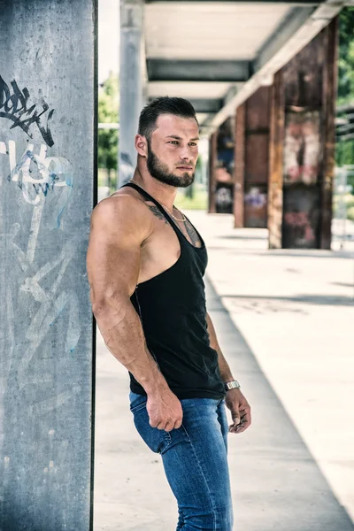 Handsome Muscular Hunk Man Outdoor in City Setting