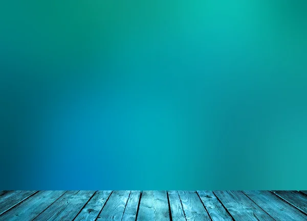 Turquoise wooden surface of the table or floor. Turquoise matte fog blur the background. Empty space texture. Abstraction of purity and freshness of the early morning on the sea.