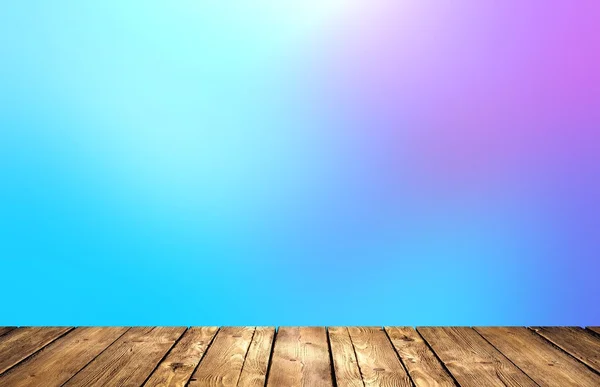 Rustic wood surface texture. Light blue pink blur background. Spring clear sky looks like.