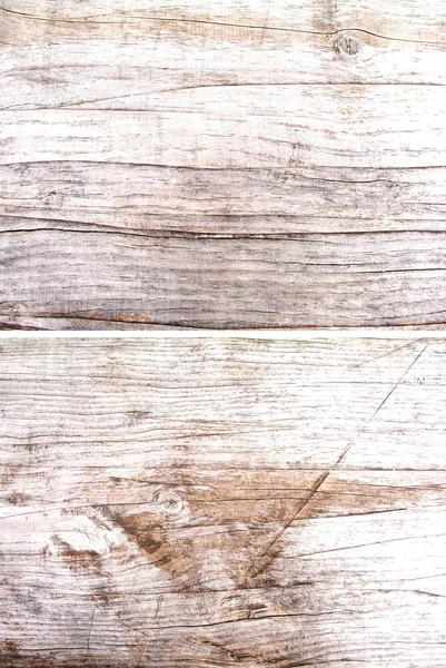 Light texture of the old wood burned by the sun and wind set backgrounds.