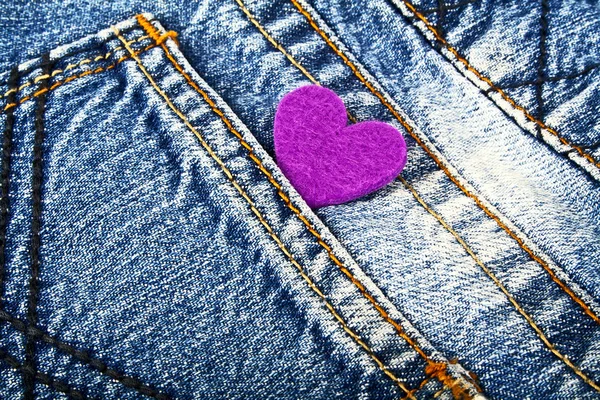 Purple heart in jeans pocket