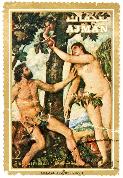 CIRCA 1971 - A stamp printed in Ajman shows Adam and Eve, The Fa