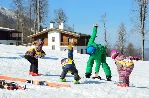 Sochi, Russia, February, 27, 2016, Ski resort Rosa Khutor. Teaching children skiing, warm-up