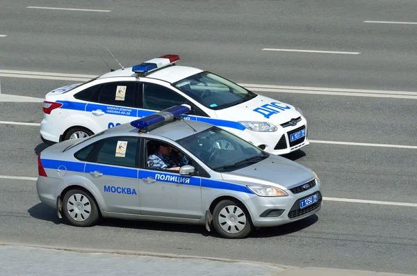 Moscow, Russia, May, 09, 2015, Russian scene: Nobody, cars of Police and Traffic police