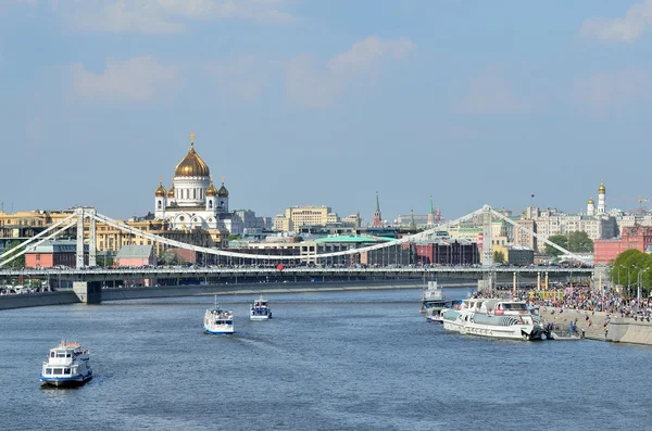 Moscow, Russia, May, 01, 2014, Russian scene: River trips on the boat on the Moscow river, a view to the Cathedral of Christ the Saviour and Krimsky bridge