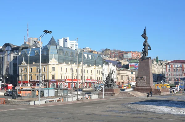 Vladivostok, Russia, January, 6, 2015, People walking on the square of the Fighters of the revolution in Vladivostok in winter