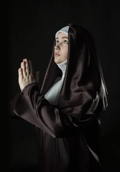 Catholic nun On black