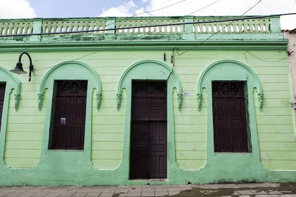Facade of colorful colonial houses in the old center of Camagüey - Central Cuba