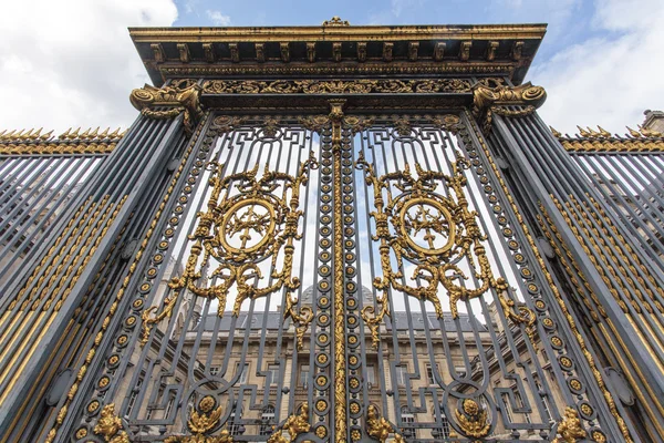 Decorated and gold plated entrance gate to the Palais de Justice de Paris (Paris court) in Paris, France - Europe