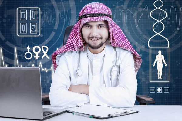 Confident Arabic doctor in laboratory
