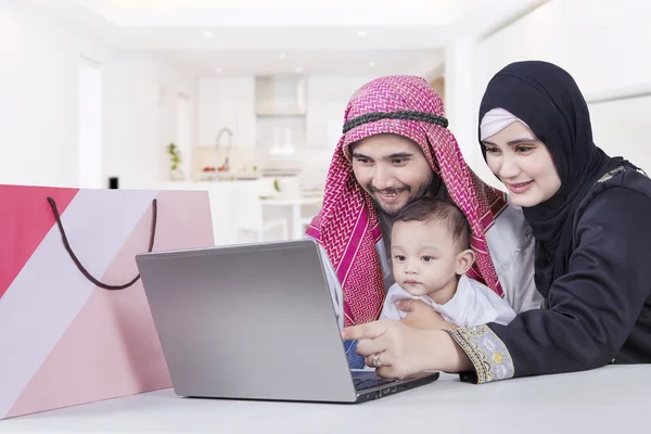 Arabic family using laptop
