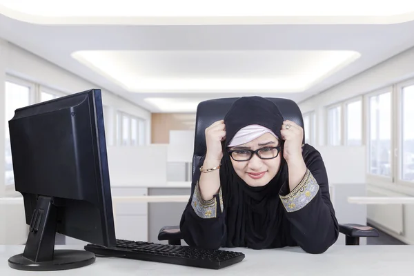Muslim businesswoman looks stressful