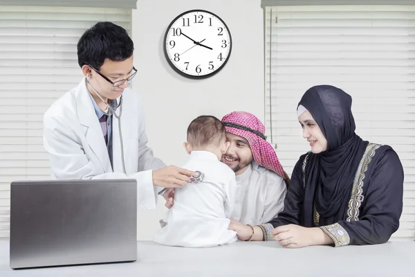 Arabic family at the specialist doctor
