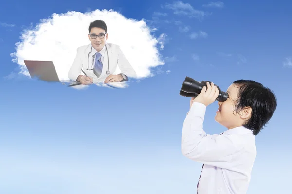 Boy looking at doctor in speech bubble