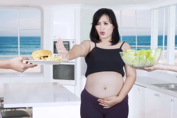 Pregnant mother reject fast food